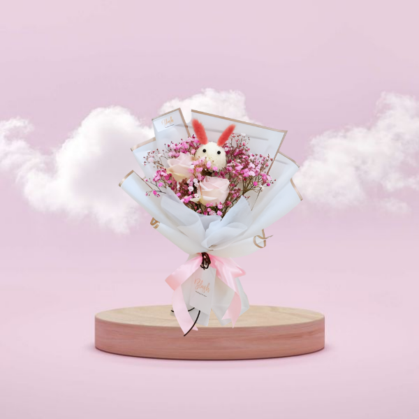 Roses bouquet on a pink show case