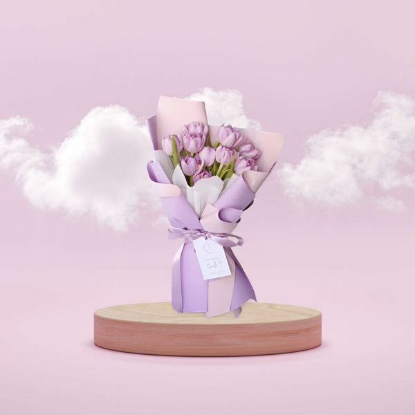 Lavender Tulip bouquet on a pink show case