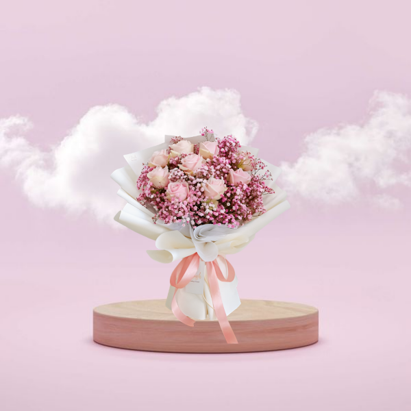 Roses bouquet on a pink show case