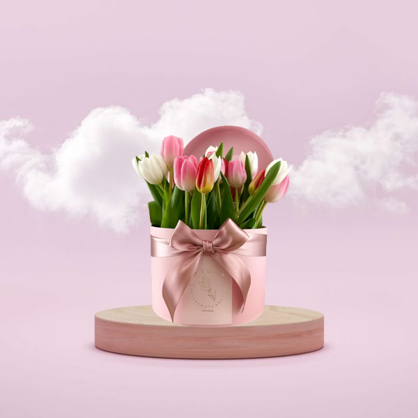 Roses bouquet on a pink show case